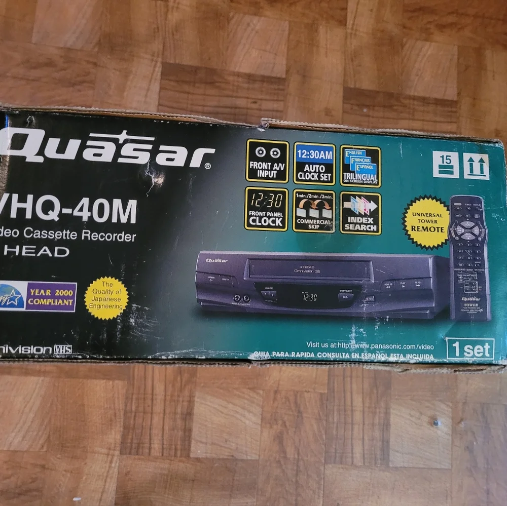 NEW QUASAR 4 HEAD VCR CASSETTE RECORDER IN THE ORIGINAL BOX.